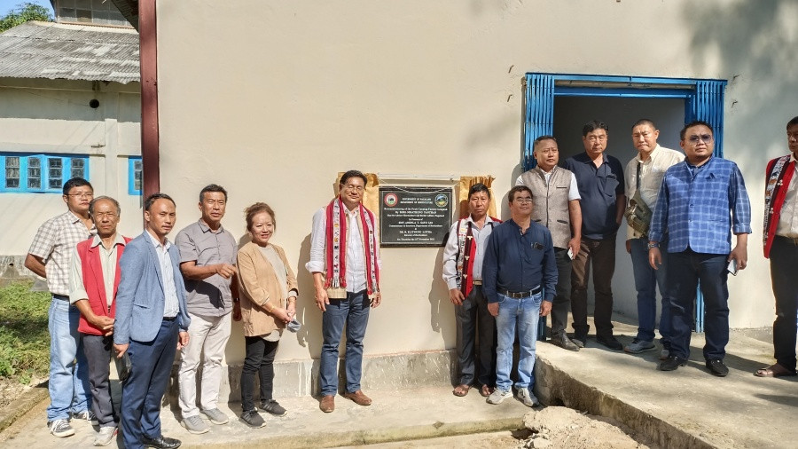 Advisor Mhathung Yanthan unveiling the plague of re-commissioning of Fruit Canning Factory at Longnak on November 18. (DIPR Photo)